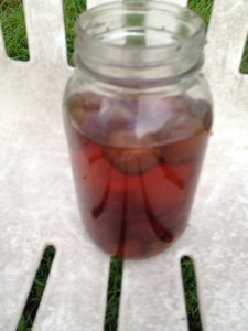 Cherry-flavored moonshine in a Mason jar