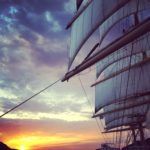Passing Greek Islands at sunset on the Royal Clipper
